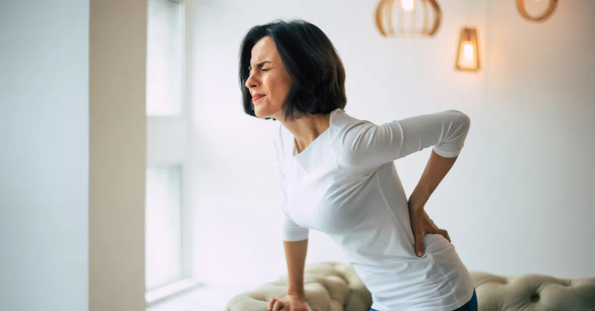 lady with pain needing Chiropractic care in Desert Ridge