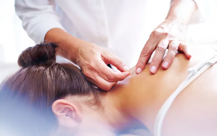 person getting acupuncture treatments