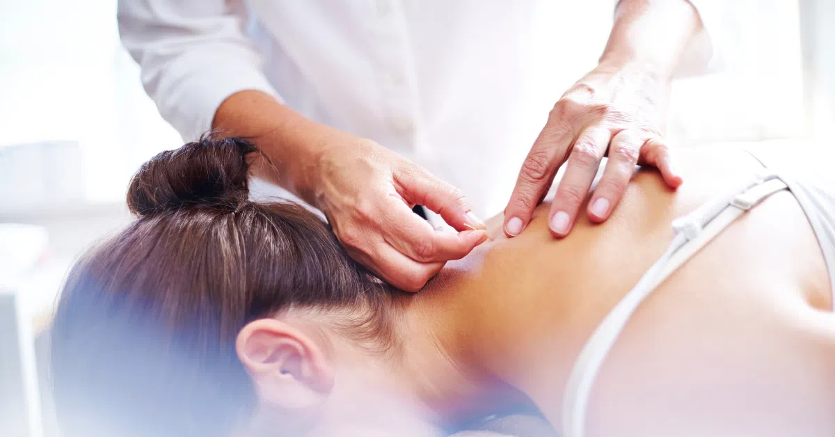 person getting acupuncture treatments